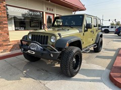 A 2013 Jeep Wrangler Unlimited SPORT